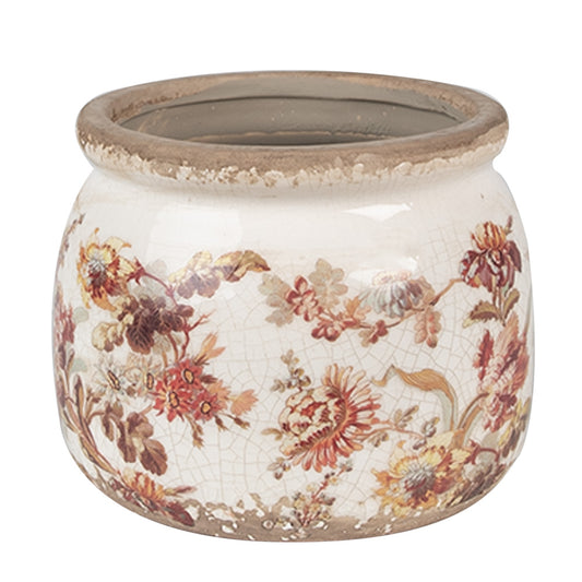 Un pot de fleurs en céramique au design vintage, orné d’un motif floral délicat aux teintes rouges, jaunes et vertes sur un fond blanc légèrement craquelé. Le bord supérieur présente une finition vieillie, ajoutant une touche d’authenticité et de charme rustique à l’ensemble.